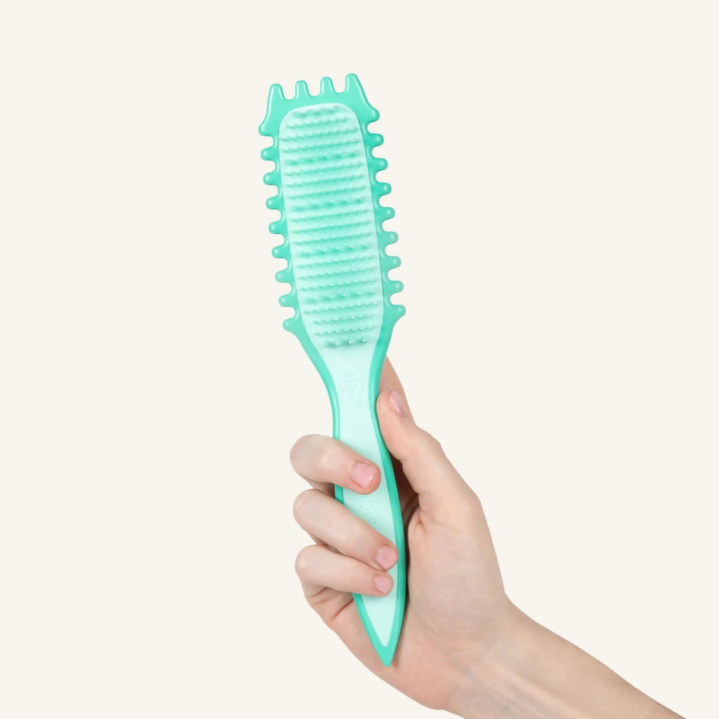 Bounce Curl Slick-Flex Define EdgeLift Brush Teal - model holding brush lifestyle shot