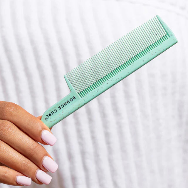 Bounce Curl Styling Comb - comb in use on curly hair lifestyle shot